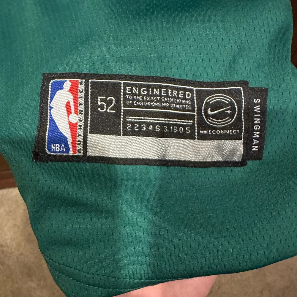 Nike Green Boston Basketball Jersey with White Accents
